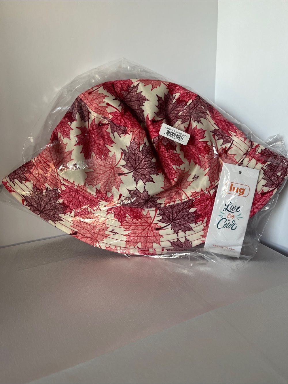 LUG - Canopy Bucket Hat in Reversible Maples Cream/Poppy Red